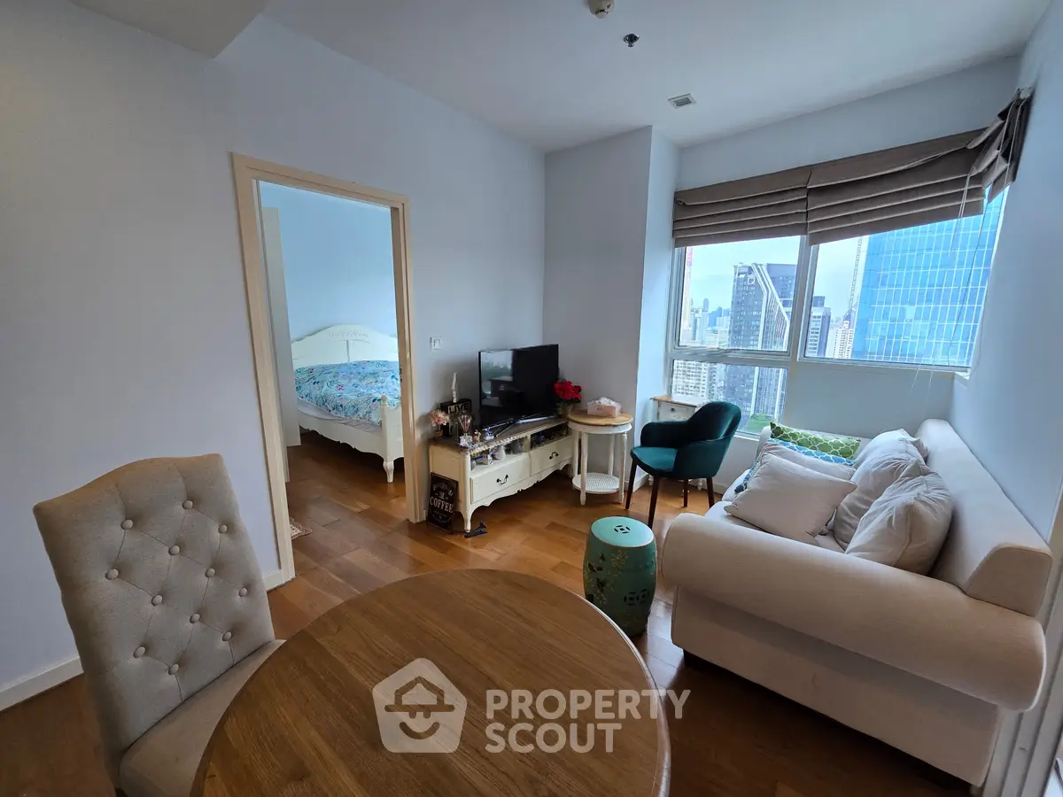 Charming city apartment with cozy living room and stunning skyline view