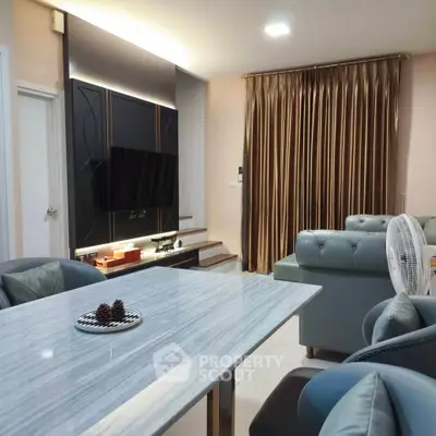 Elegant living room with modern furniture and stylish decor, featuring a marble dining table and luxurious curtains.