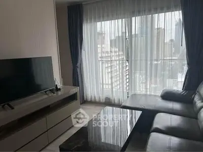 Modern living room with city view and sleek furniture