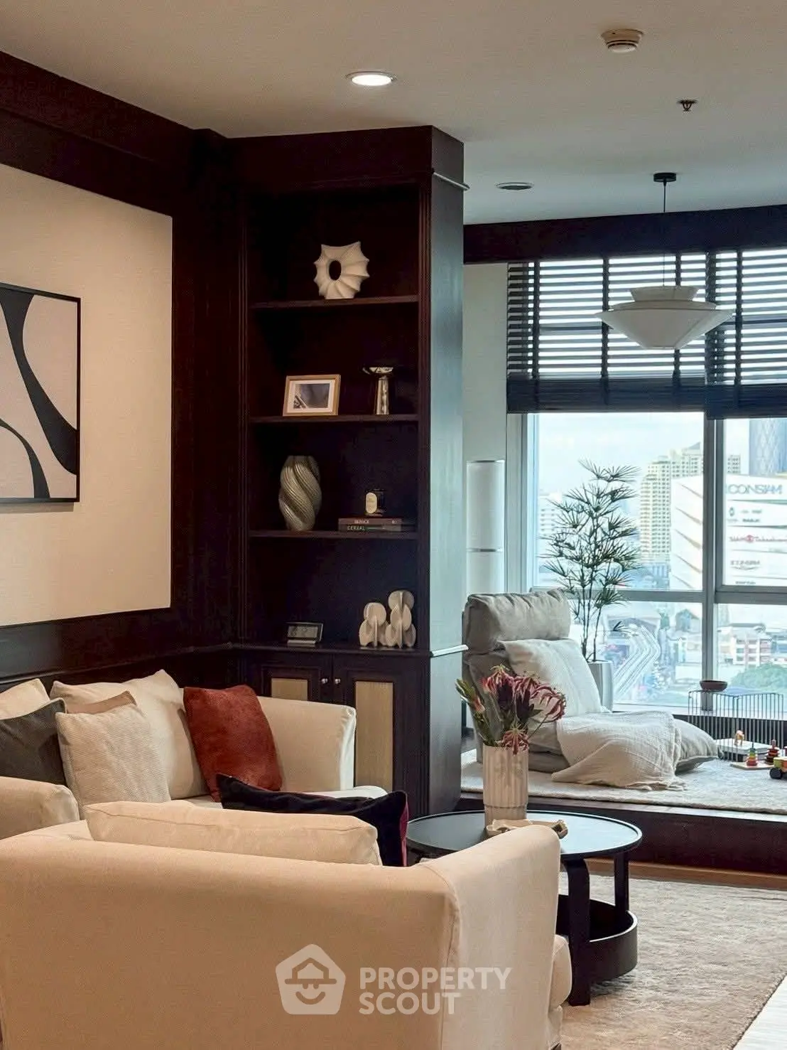 Luxurious living room with elegant decor and stunning city view