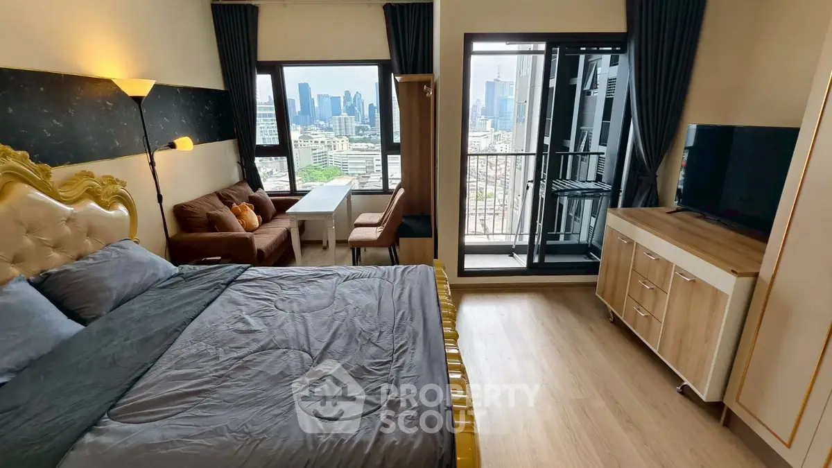 Luxurious bedroom with city view and elegant furnishings in modern apartment