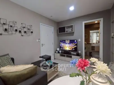 Cozy living room with modern decor and entertainment setup