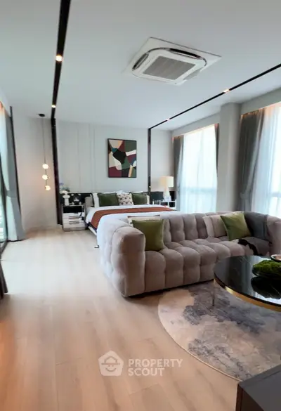 Luxurious modern bedroom with stylish decor and plush furnishings