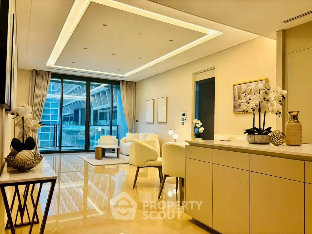 Luxurious modern living room with elegant decor and stunning city view, featuring open layout and stylish furnishings.