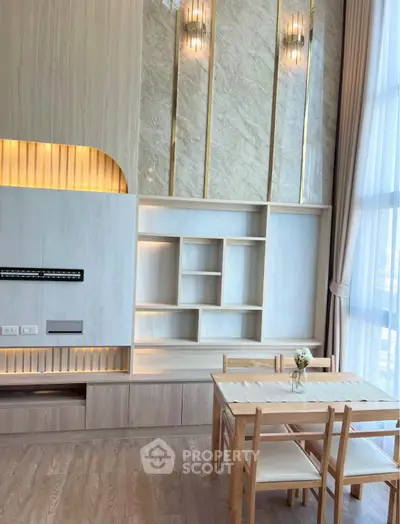 Modern living room with elegant wood paneling and stylish dining area