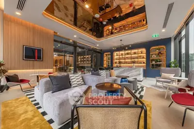 Luxurious modern living room with stylish furniture and elegant lighting in a contemporary apartment.