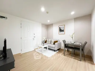 Modern living room with cozy sofa and dining area, perfect for relaxation and entertainment.