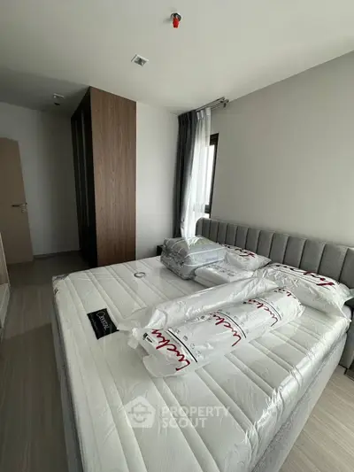Modern bedroom with new mattress and stylish decor