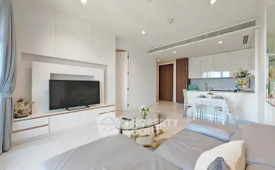 Modern living room with sleek design and open kitchen layout