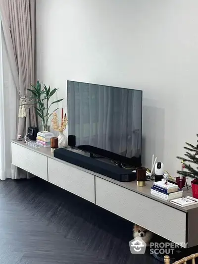 Modern living room with sleek TV stand and stylish decor