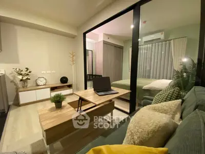 Modern apartment interior with cozy living room and bedroom, stylish decor and natural lighting.