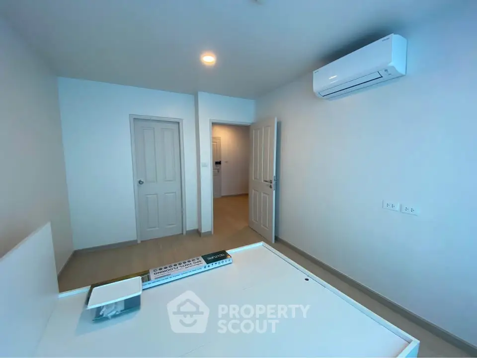Modern bedroom with air conditioning and minimalist design