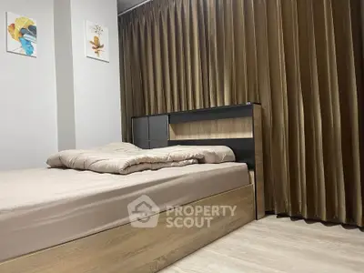 Modern bedroom with elegant brown curtains and stylish wooden bed frame.