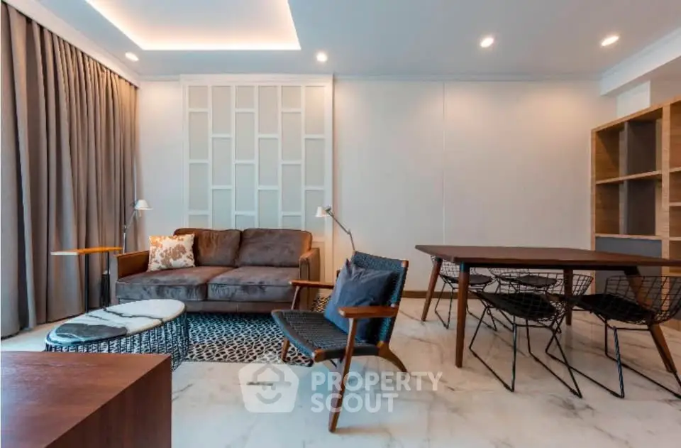 Modern living room with stylish furniture and elegant lighting