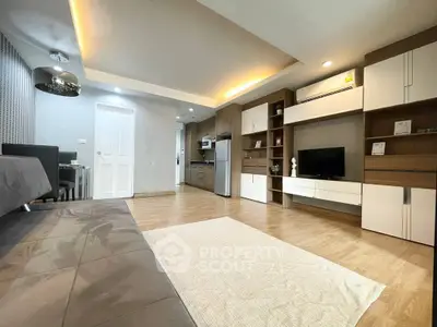 Spacious modern living room with open kitchen and stylish decor