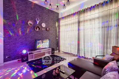 Stylish living room with modern decor and colorful lighting effects