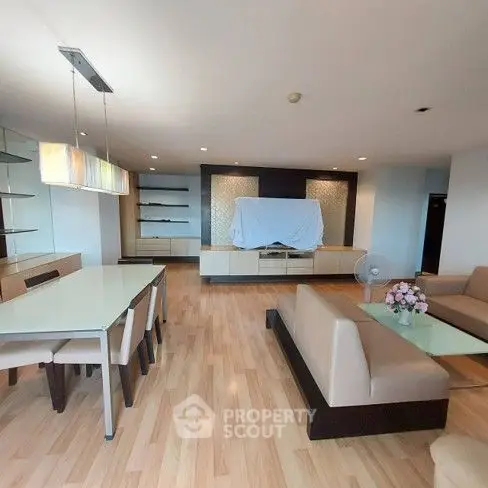 Spacious modern living room with elegant dining area and stylish decor