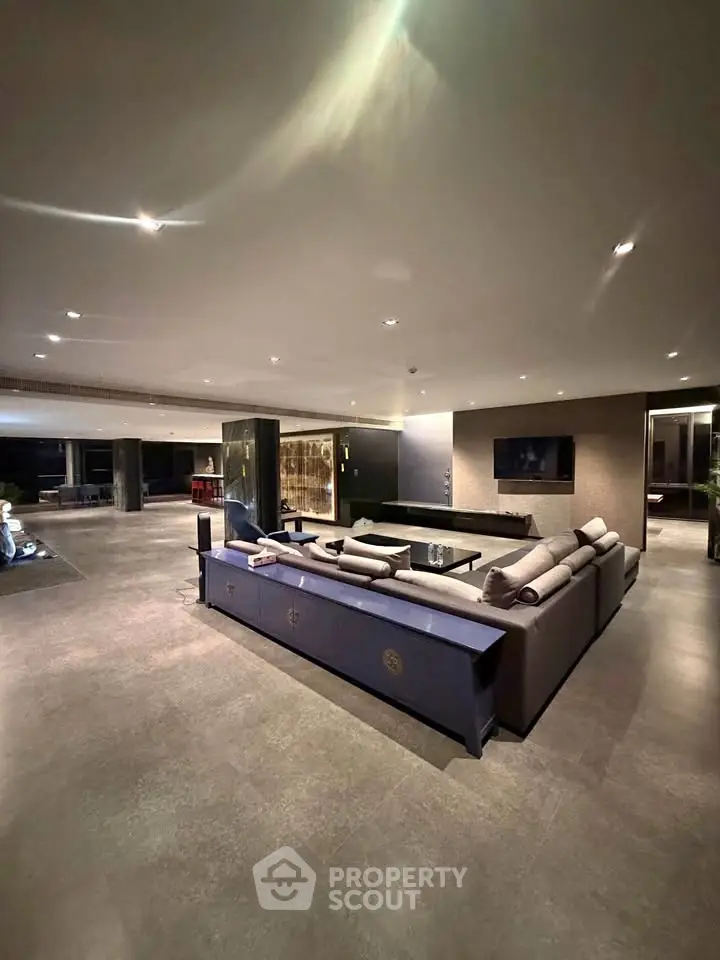 Luxurious modern living room with elegant furniture and ambient lighting