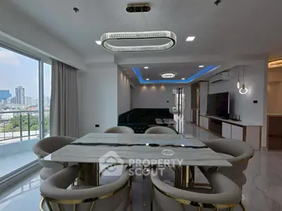 Luxurious modern living room with city view, elegant dining area, and stylish lighting fixtures.