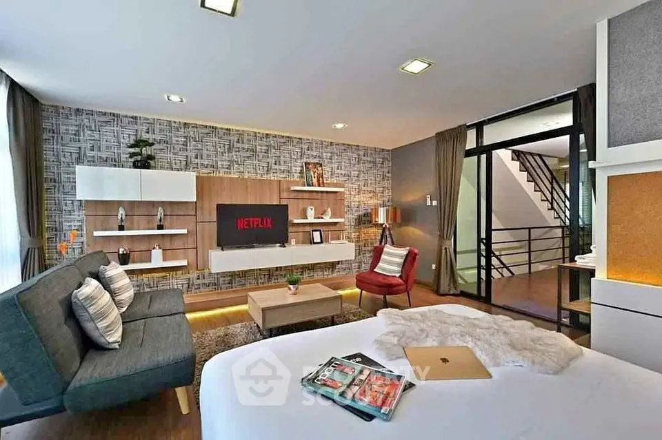 Modern living room with stylish decor and cozy seating area