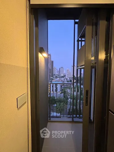 Modern balcony with city view in high-rise apartment