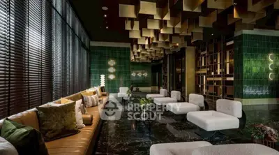 Luxurious modern living room with unique ceiling design and elegant seating area.