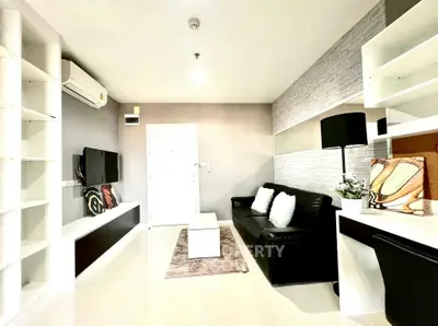 Modern living room with sleek furniture and stylish decor