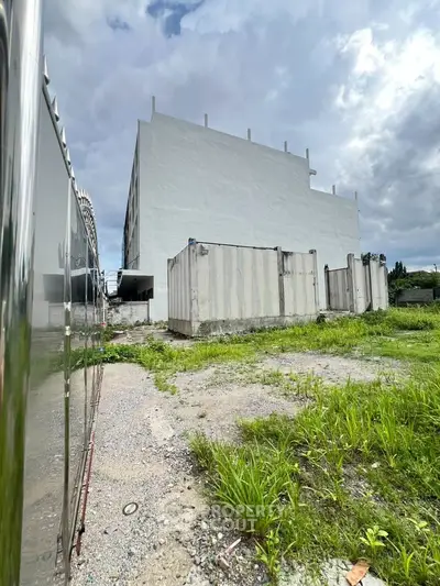 Explore this spacious building with ample outdoor space, perfect for development opportunities.
