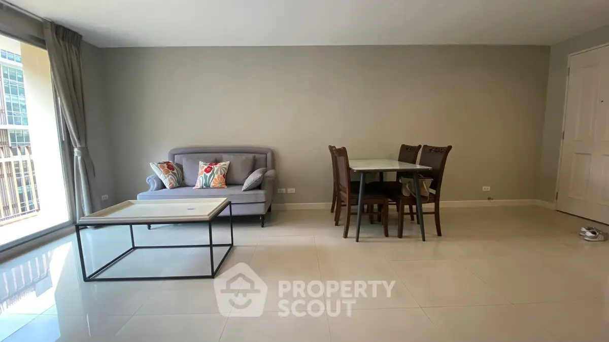 Spacious living room with modern furniture and natural light