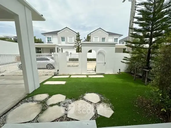 Charming suburban home with lush garden and modern architecture.