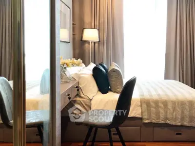 Elegant bedroom with modern decor and cozy ambiance