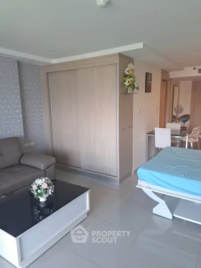 Modern living room with sleek furniture and stylish decor in a contemporary apartment.