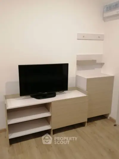 Modern living room with sleek TV stand and minimalist decor