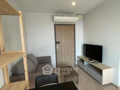 Modern living room with air conditioning and sleek furniture