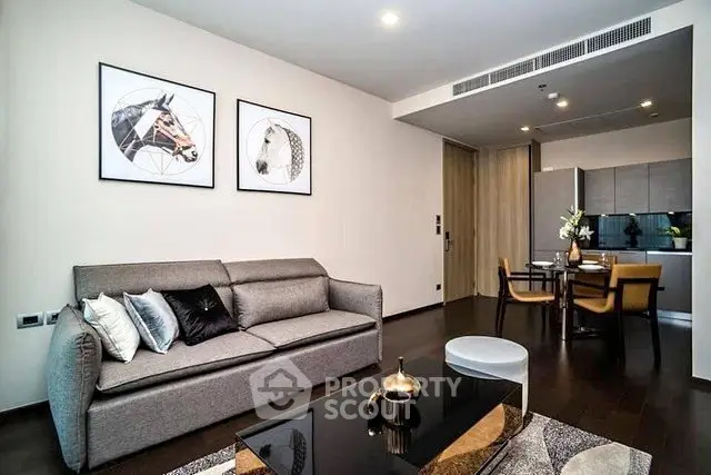 Modern living room with stylish decor and open kitchen layout