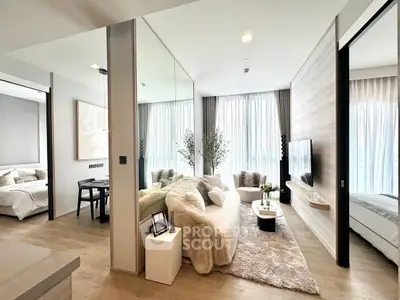 Luxurious modern living room with cozy decor and large windows