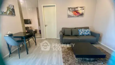 Modern living room with stylish decor and cozy seating area