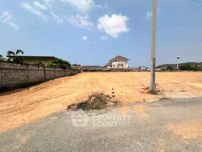 Prime vacant land for sale with development potential in a serene neighborhood.