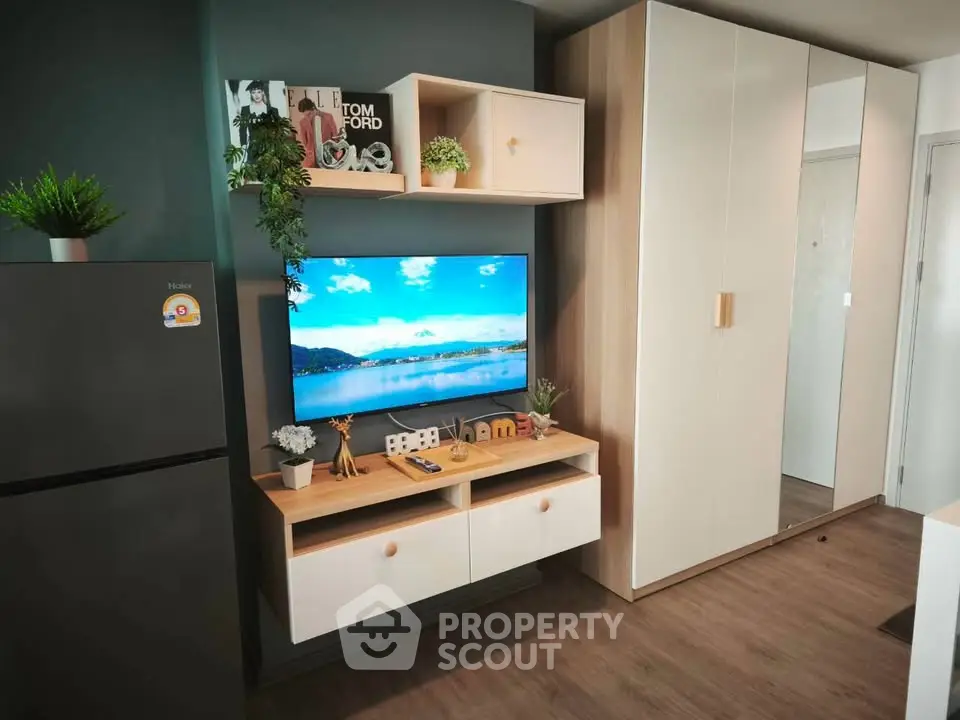Modern living room with sleek storage and stylish decor