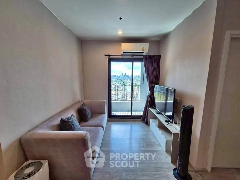 Modern living room with city view and balcony access