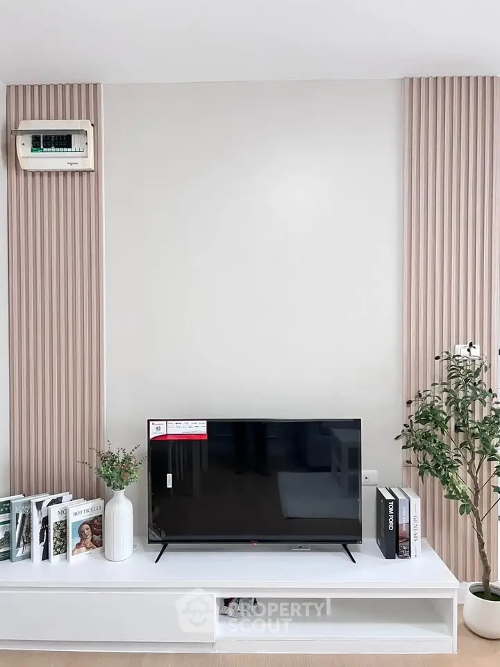 Modern living room with sleek TV setup and stylish decor
