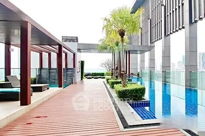 Luxurious rooftop pool with stunning city views and modern design elements.