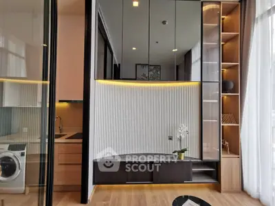 Modern apartment interior with stylish kitchen and washing machine