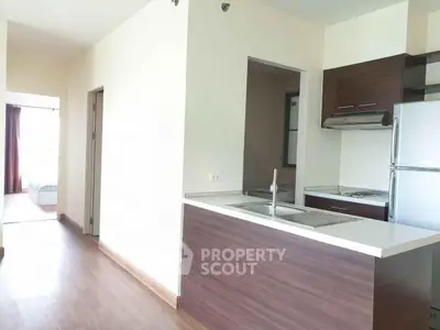 Modern kitchen with sleek design and open layout in a bright apartment