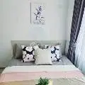 Cozy bedroom with stylish decor and natural light