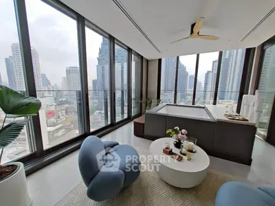 Luxurious high-rise living room with panoramic city views and modern decor