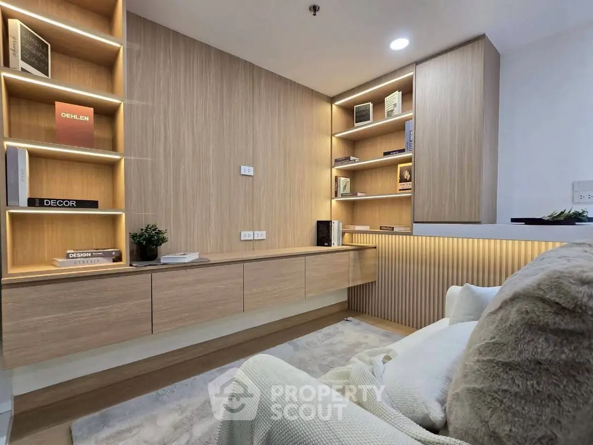Modern living room with stylish wooden shelves and cozy seating area