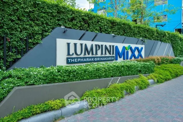 Lush entrance of Lumpini Mixx Thepharak-Srinakarin with vibrant greenery