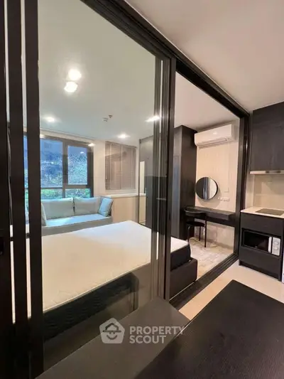 Modern studio apartment with sleek design and natural light