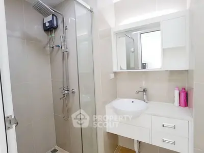 Modern bathroom with sleek shower and stylish vanity unit